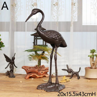2 DESINS - ANTIQUE RUSTIC CAST IRON CRANE/HERON STATUE