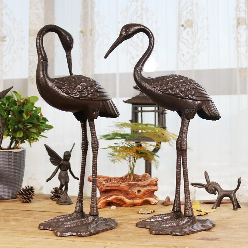 2 DESINS - ANTIQUE RUSTIC CAST IRON CRANE/HERON STATUE
