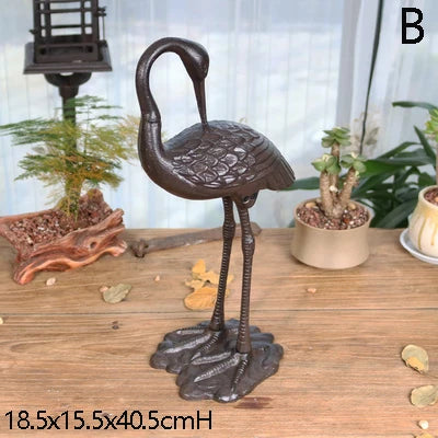 2 DESINS - ANTIQUE RUSTIC CAST IRON CRANE/HERON STATUE