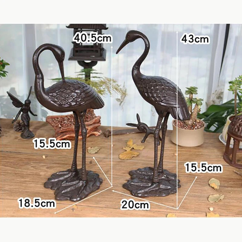 2 DESINS - ANTIQUE RUSTIC CAST IRON CRANE/HERON STATUE