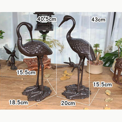 2 DESINS - ANTIQUE RUSTIC CAST IRON CRANE/HERON STATUE